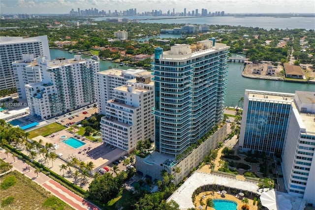 bird's eye view featuring a water view and a view of city