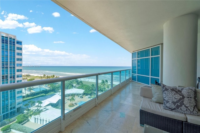 balcony featuring a water view