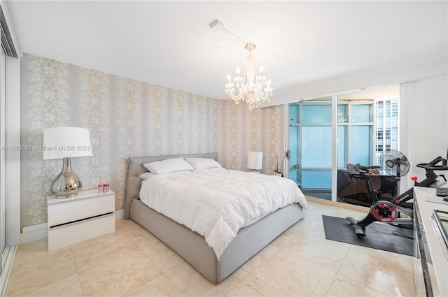 bedroom featuring an inviting chandelier, marble finish floor, baseboards, and wallpapered walls