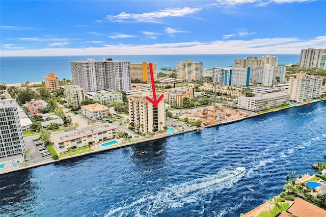 drone / aerial view with a water view