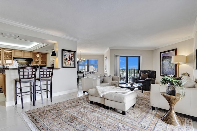 living room featuring a notable chandelier, crown molding, and light tile patterned floors