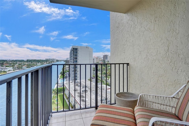 balcony featuring a water view