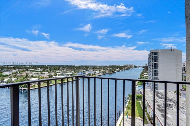 balcony featuring a water view