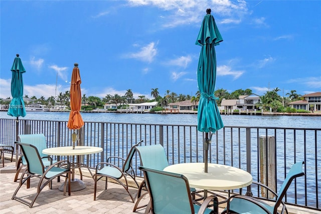 view of patio / terrace with a water view