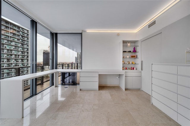 tiled office with expansive windows