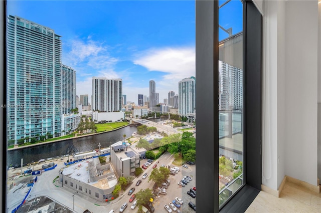 balcony featuring a water view