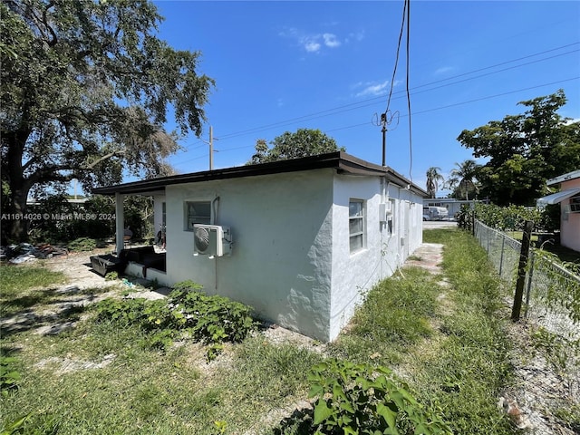 view of home's exterior featuring a yard