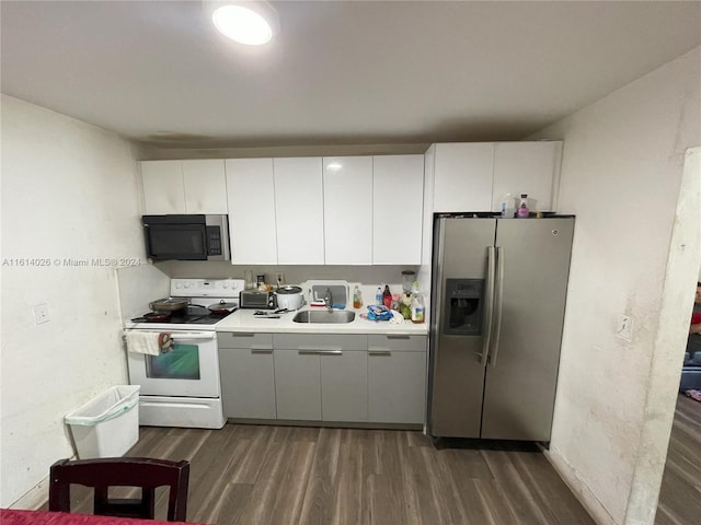 kitchen featuring white range with electric cooktop, stainless steel refrigerator with ice dispenser, sink, white cabinets, and dark hardwood / wood-style floors