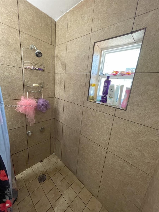 bathroom with a shower with shower curtain