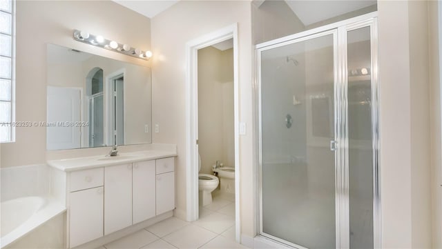 full bathroom with toilet, tile patterned floors, vanity, a bidet, and separate shower and tub