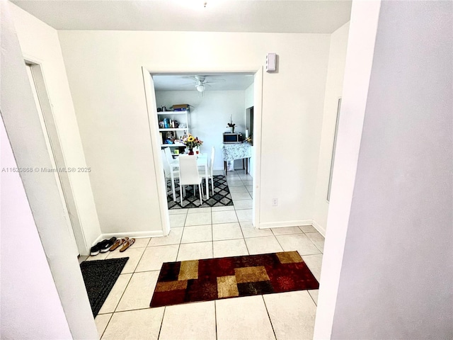 dining space featuring tile patterned flooring