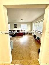 living room with light tile patterned floors