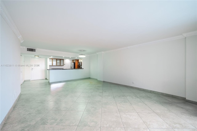 unfurnished living room featuring crown molding, baseboards, visible vents, and light tile patterned floors