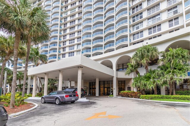 3800 S Ocean Dr Unit 1512A, Hollywood, FL 33019 - view of apartment building / complex featuring uncovered parking