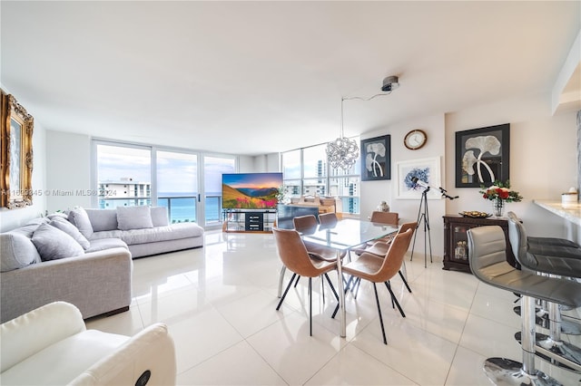 3800 S Ocean Dr Unit 1512A, Hollywood, FL 33019 - dining space featuring light tile patterned floors and a wall of windows