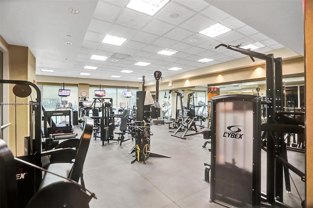 gym featuring a paneled ceiling