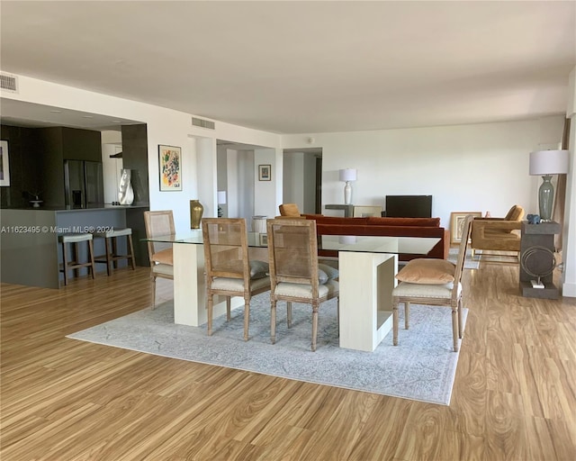 dining room featuring light wood-type flooring