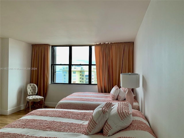 bedroom featuring hardwood / wood-style flooring