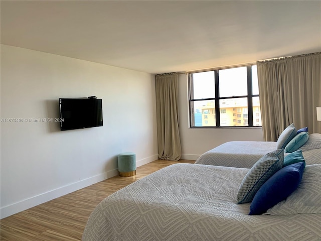 bedroom featuring light hardwood / wood-style floors