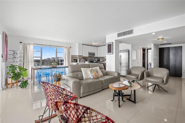 living room featuring light tile patterned floors