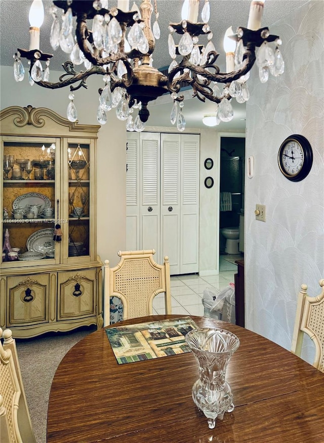 dining room with a textured ceiling