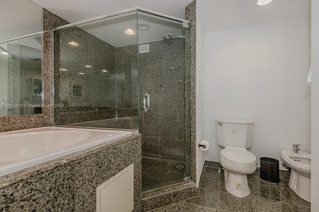 bathroom with a bidet, vanity, toilet, and walk in shower