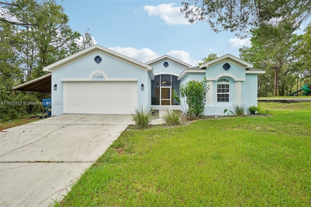 single story home with a front lawn and a carport