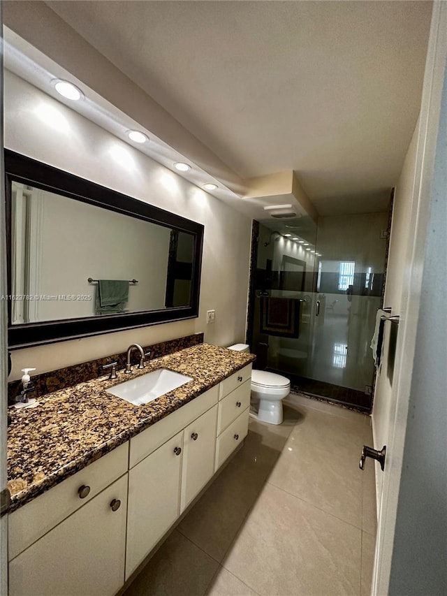 1501 S Ocean Dr Unit 201, Hollywood, FL 33019 - full bathroom with tile patterned floors, a stall shower, toilet, vanity, and recessed lighting