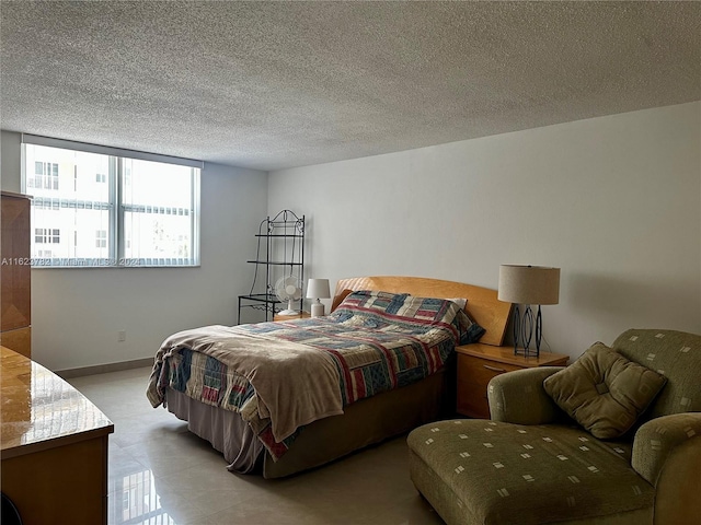 bedroom featuring a textured ceiling