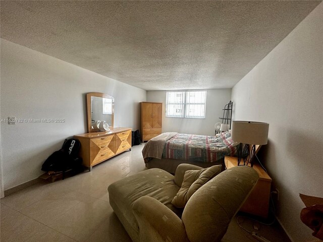 bedroom featuring a textured ceiling