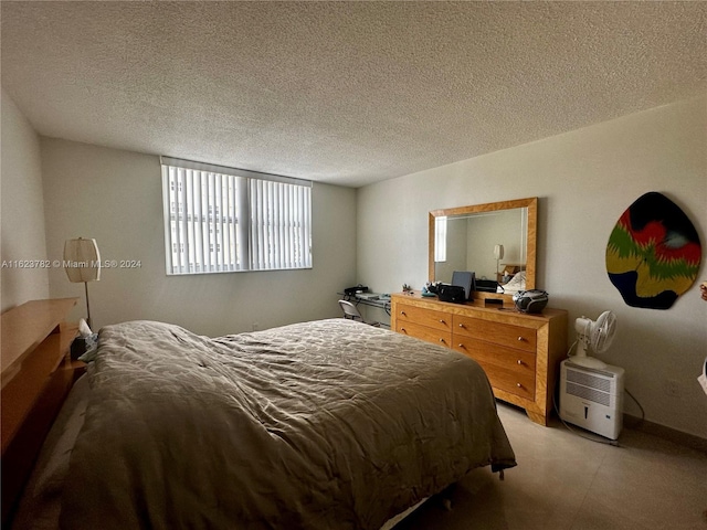 bedroom with a textured ceiling