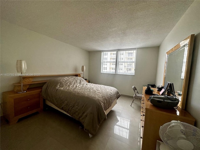 1501 S Ocean Dr Unit 201, Hollywood, FL 33019 - bedroom with a textured ceiling and baseboards