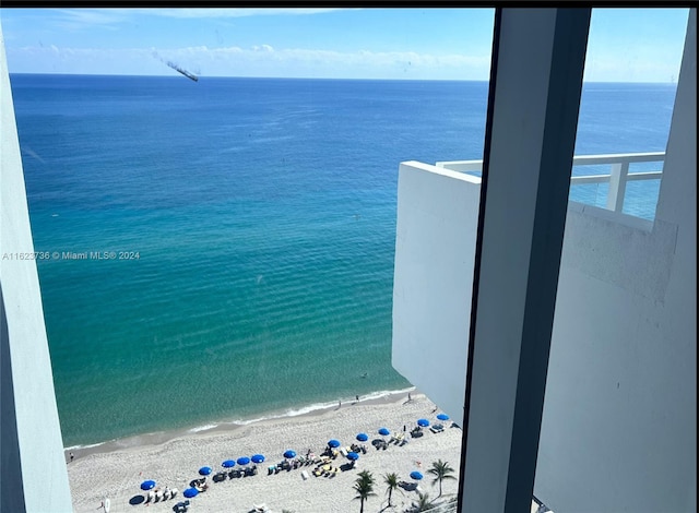 property view of water featuring a beach view