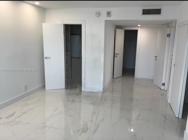 2030 S Ocean Dr Unit 2220, Hallandale Beach, FL 33009 - unfurnished room featuring baseboards, light marble finish floors, and a smoke detector