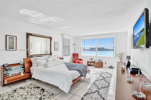 bedroom featuring light tile patterned floors