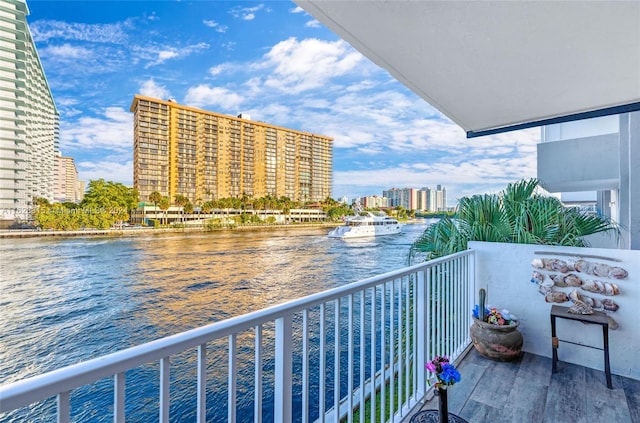 balcony featuring a water view