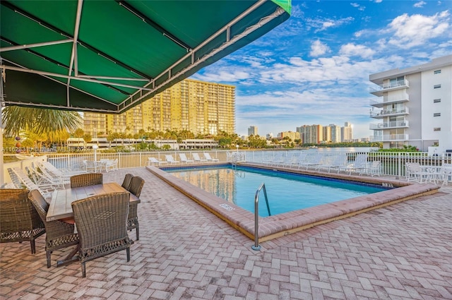 view of pool with a patio