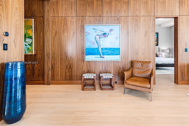 sitting room with light hardwood / wood-style floors