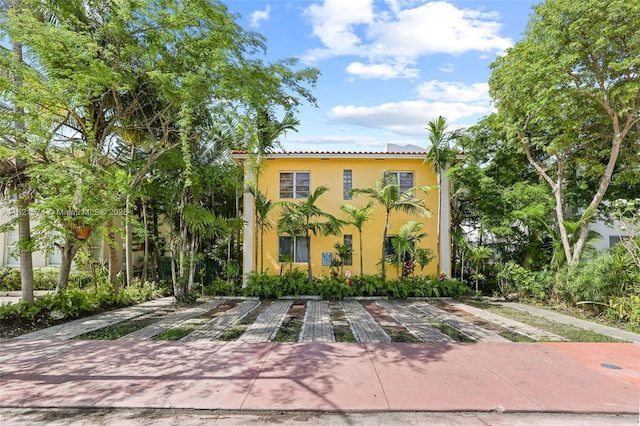 1310 15th St, Miami Beach, FL 33139 - mediterranean / spanish-style house with stucco siding and uncovered parking