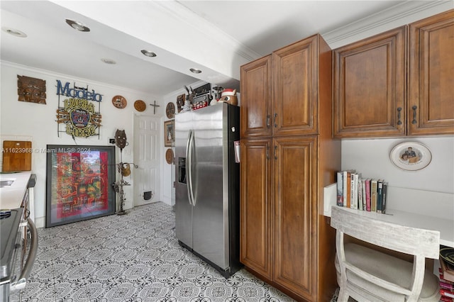 kitchen with appliances with stainless steel finishes, crown molding, light tile patterned flooring, and tasteful backsplash