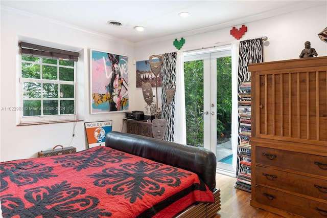 office area with french doors, hardwood / wood-style flooring, and ornamental molding