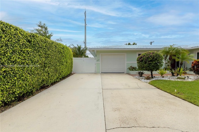 exterior space featuring a garage