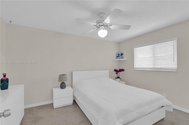 bedroom with light tile patterned floors and ceiling fan