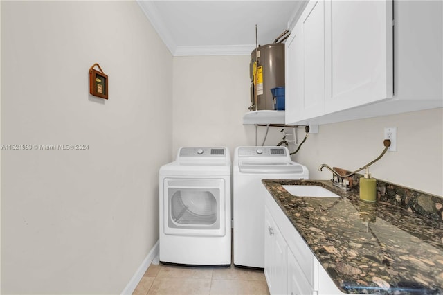 laundry room with water heater, sink, light tile patterned floors, crown molding, and independent washer and dryer