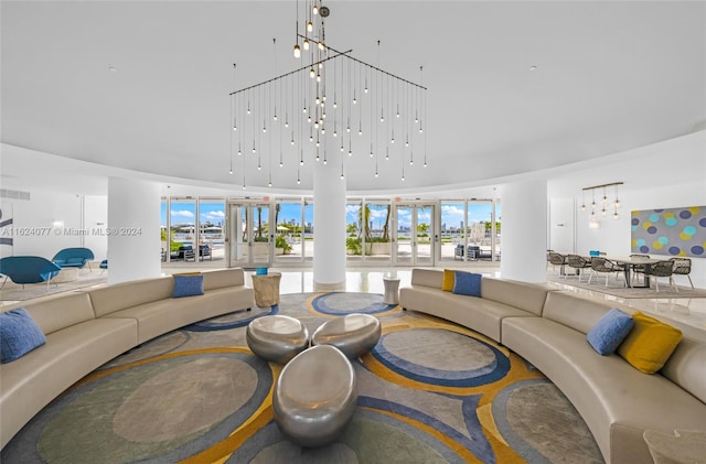 living room with a notable chandelier