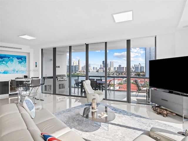 living room featuring a wall of windows