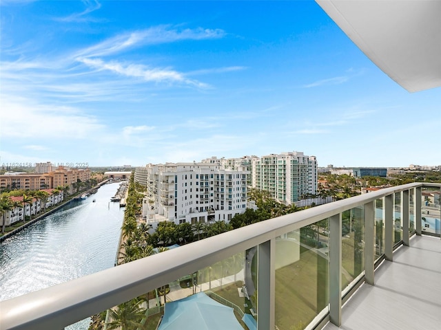 balcony featuring a water view