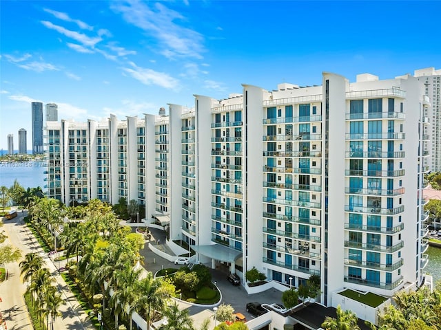 view of building exterior with a water view