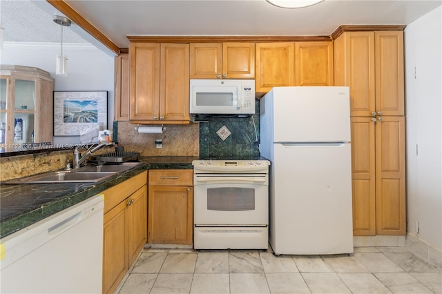 kitchen with light tile patterned flooring, white appliances, hanging light fixtures, sink, and ornamental molding