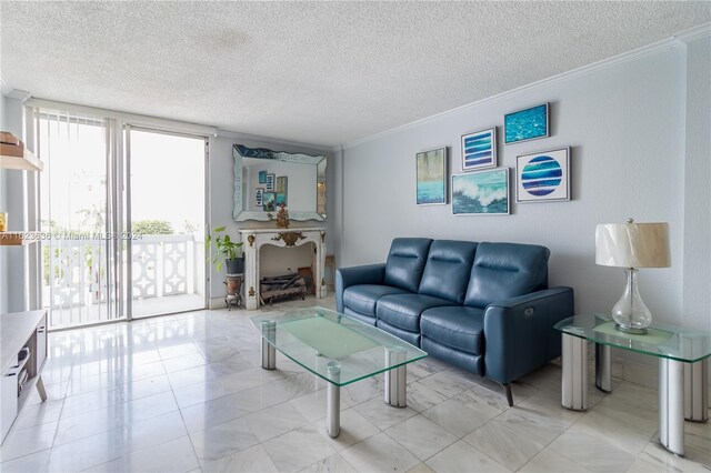 tiled living room with a textured ceiling and ornamental molding